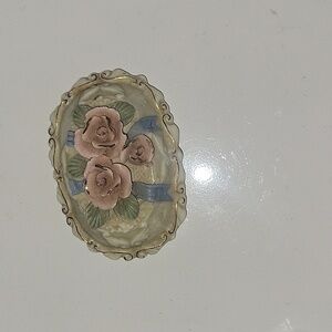 Small Figurine With Flowers